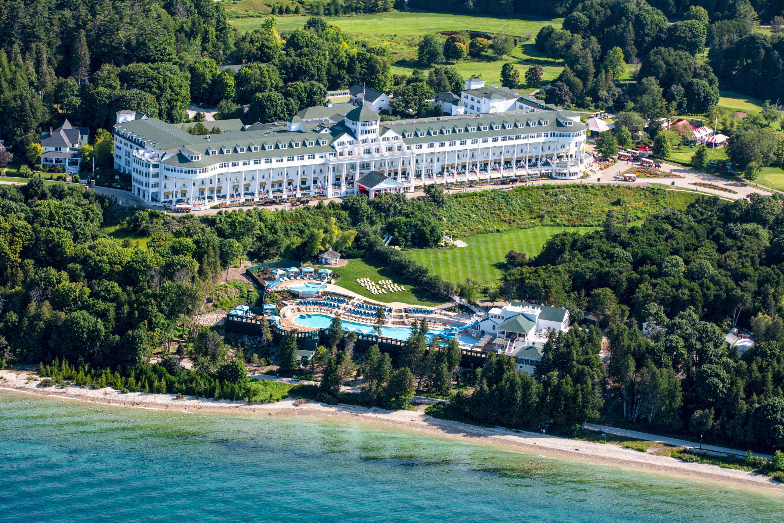 Image of the ariel view of Grand Hotel with views of the entire property. Grand Hotel, a member of Historic Hotels since 2001, dates to 1886. It is located in Mackinac Island, Michigan.