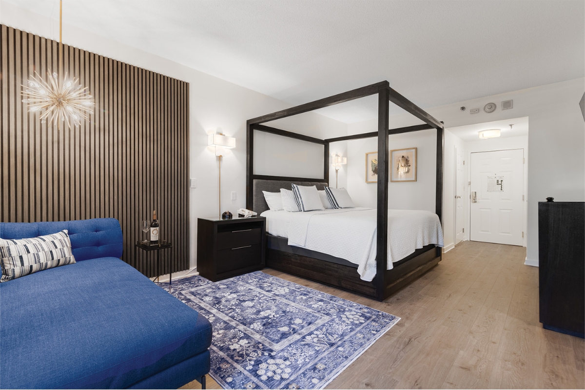 Image of the Albert Einstein Suite at The Nassau Inn (1756), a member of Historic Hotels of America since 2024. Pictured is a four-poster bed an