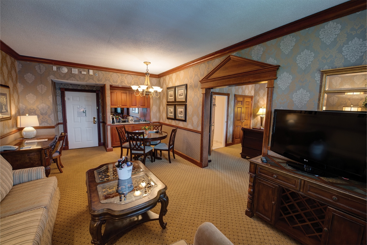 Image of the George Washington Suite at The Nassau Inn (1756), a member of Historic Hotels of America since 2024. Pictured are several tables and seating options.