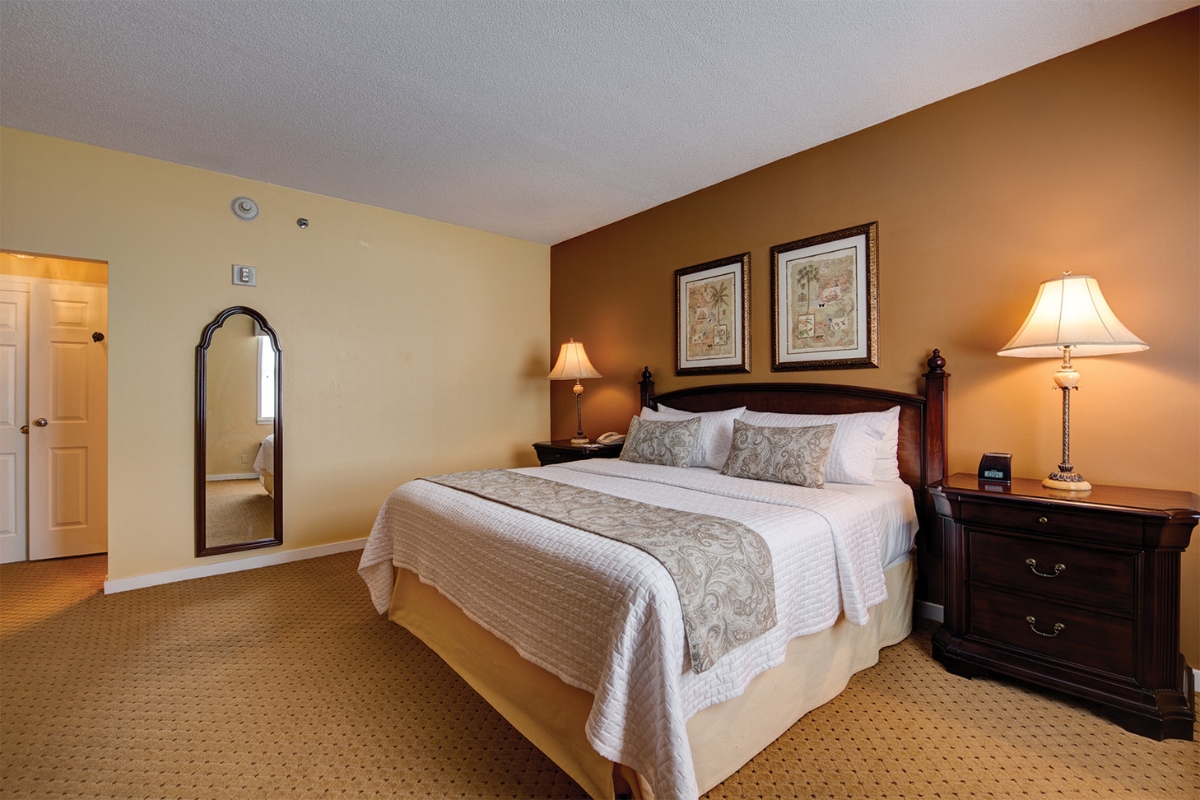 Image of the Judge Thomas Leonard Suite at The Nassau Inn (1756), a member of Historic Hotels of America since 2024. Pictured is a large bed and other furnishings.