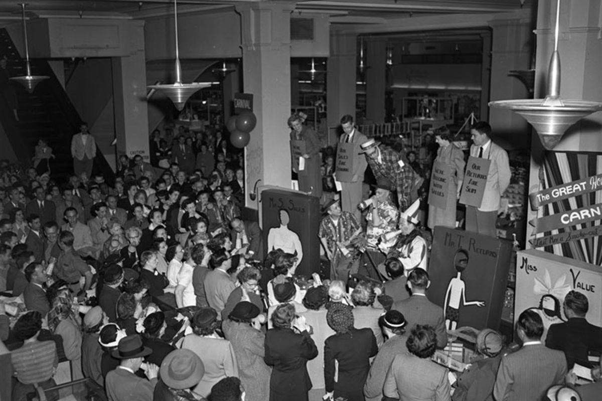 Historic image of a sale at Hilton Richmond Downtown (1885), a member of Historic Hotels of America since 2024. Pictured is a large crowd at the former department store.