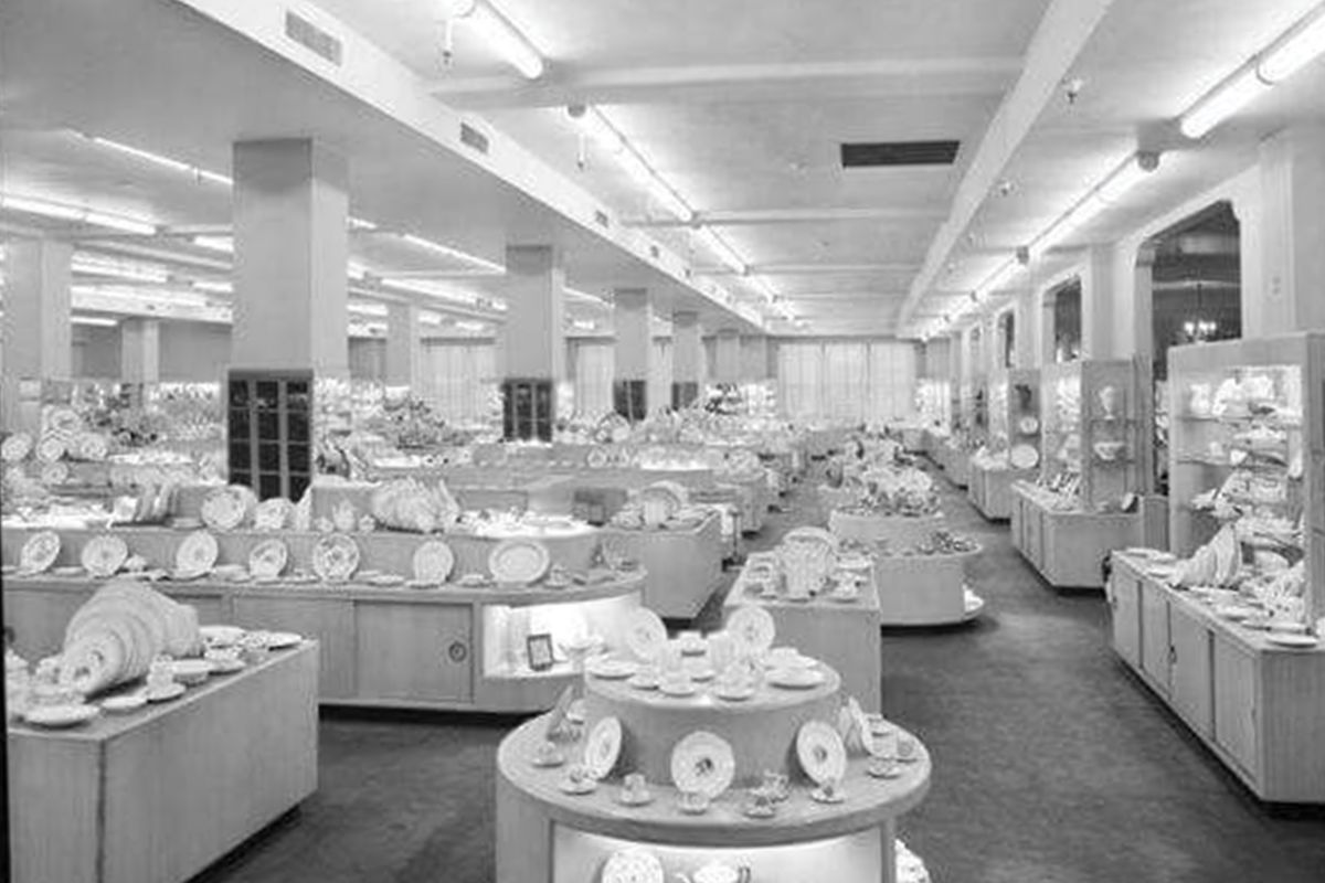 Historic image of the shopfloor at Hilton Richmond Downtown (1885), a member of Historic Hotels of America since 2024. Pictured are shelves of china on display on a former shopfloor.