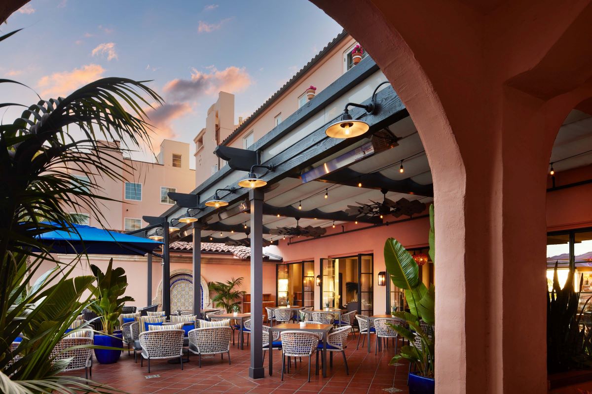 Image of Outdoor Patio Seating at La Valencia Hotel, 1926, Member of Historic Hotels of America, in La Jolla, California.