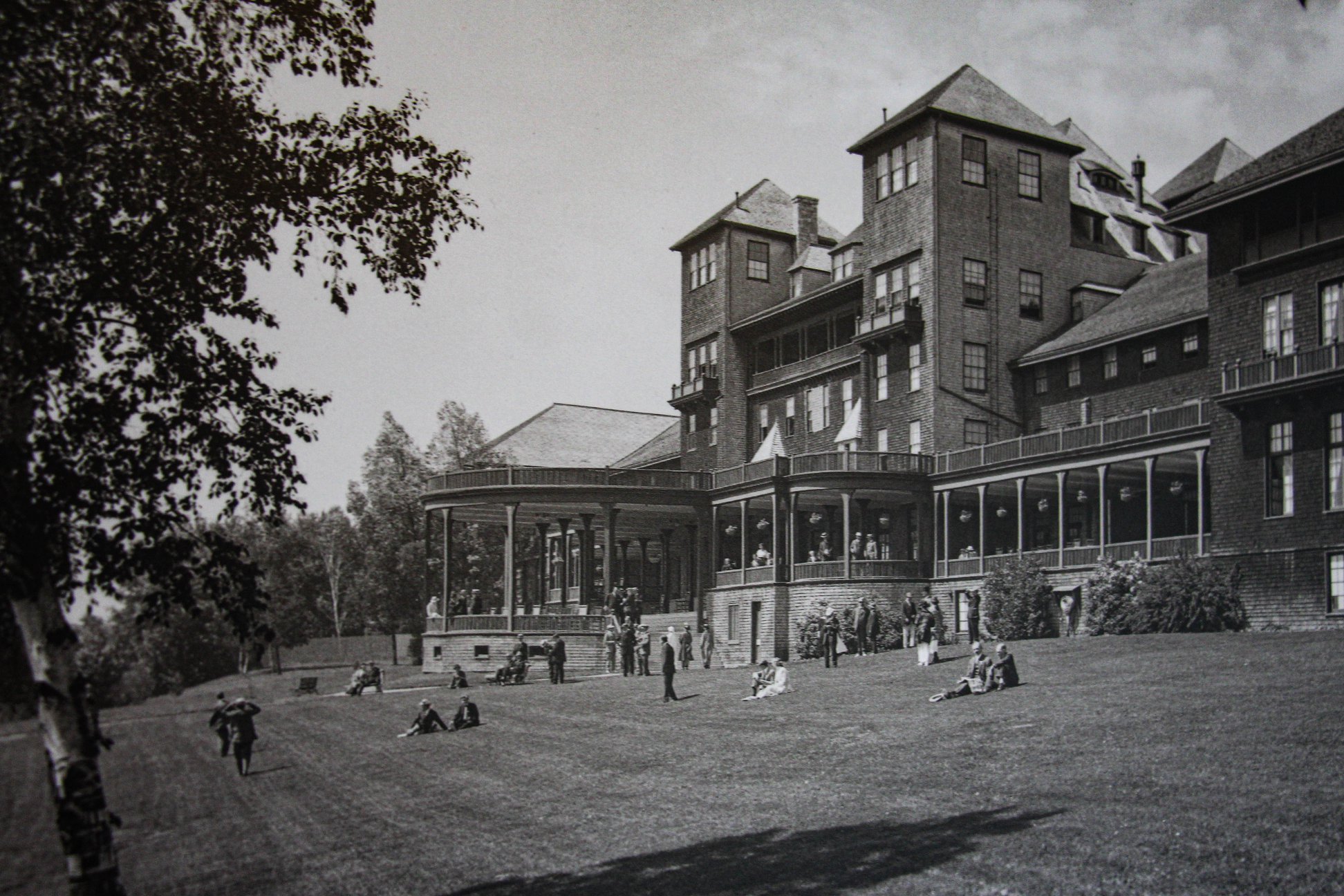 Historical image of guests lounging on the grounds of Fairmont Le Manoir Richelieu, 1899, a member of Historic Hotels Worldwide since 2018, Charlevoix, Quebec, Canada