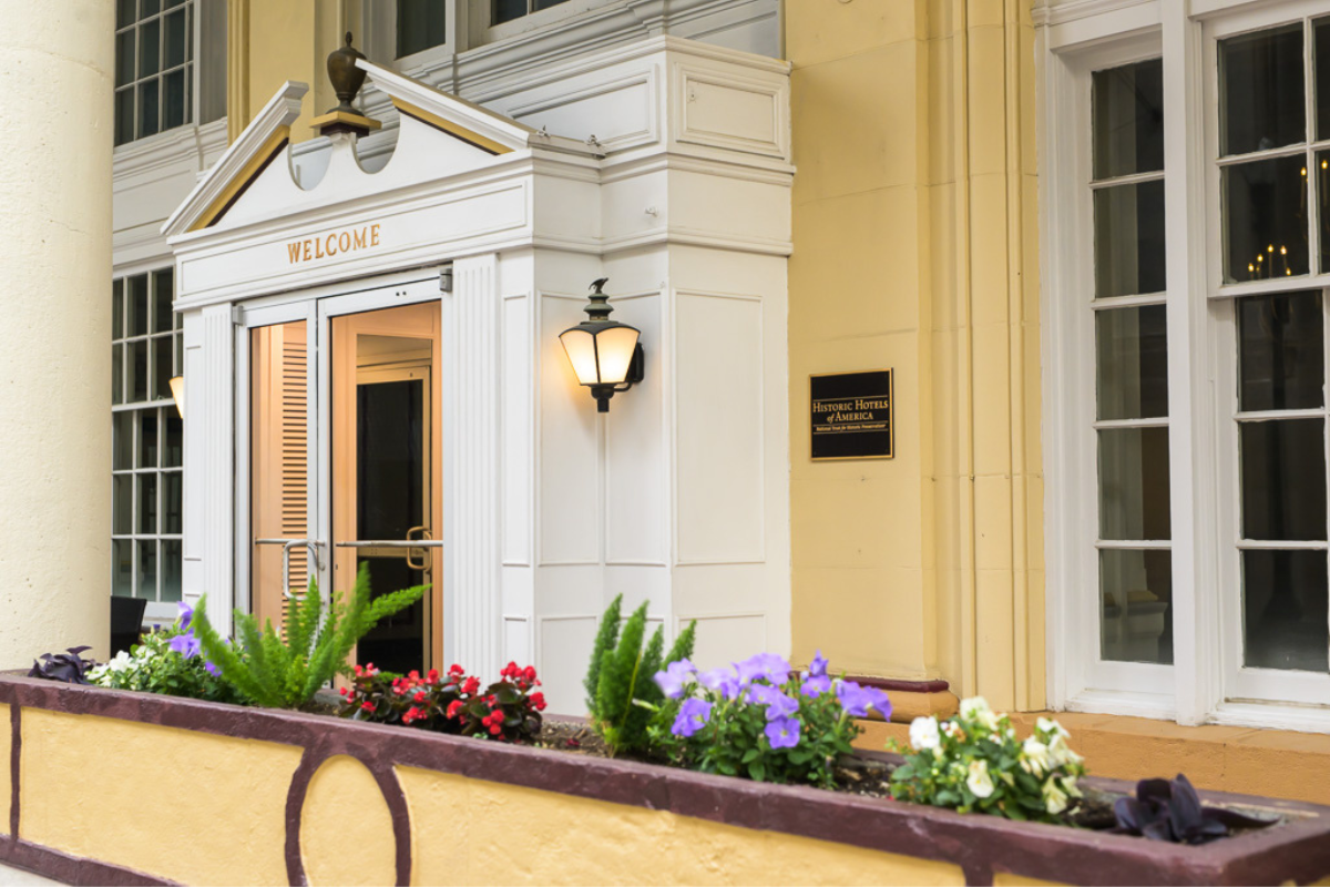 Image of Historic Hotels of America plaque near the entrance at the George Washington Hotel in Washington, Pennsylvania, is a member of Historic Hotels of America since 2023.