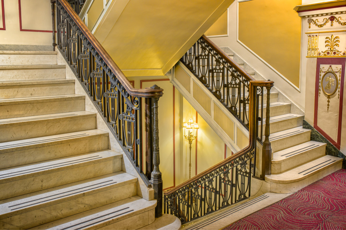 Image of Staircase in Hotel Lobby at the George Washington Hotel in Washington, Pennsylvania, is a member of Historic Hotels of America since 2023.